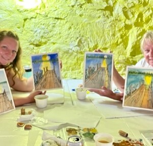 Four Soudan women enjoyed the evening together: L-R around the table: Heather Anderson, Kaylee Bjorgo, Gen Bjorgo, and Kassie Bjorgo.